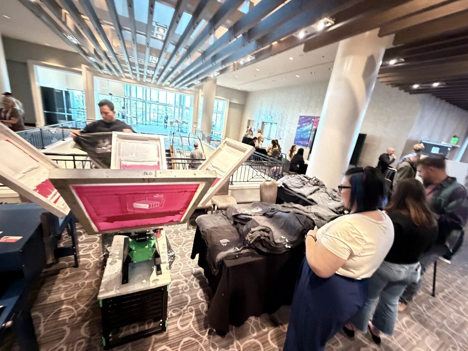 Live merch station at a New Orleans corporate conference